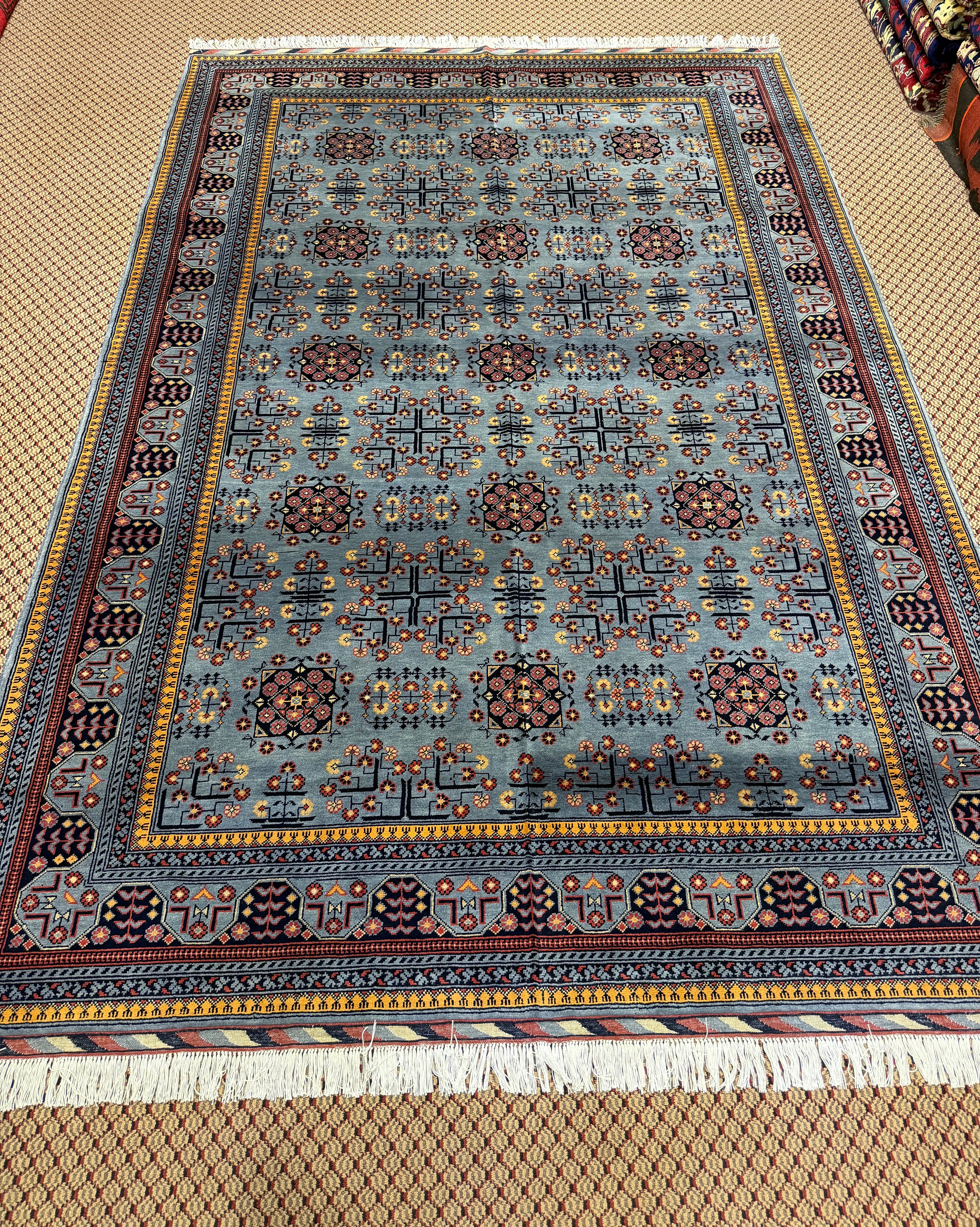 Kazak – Slate Blue & Mauve Medallion Field