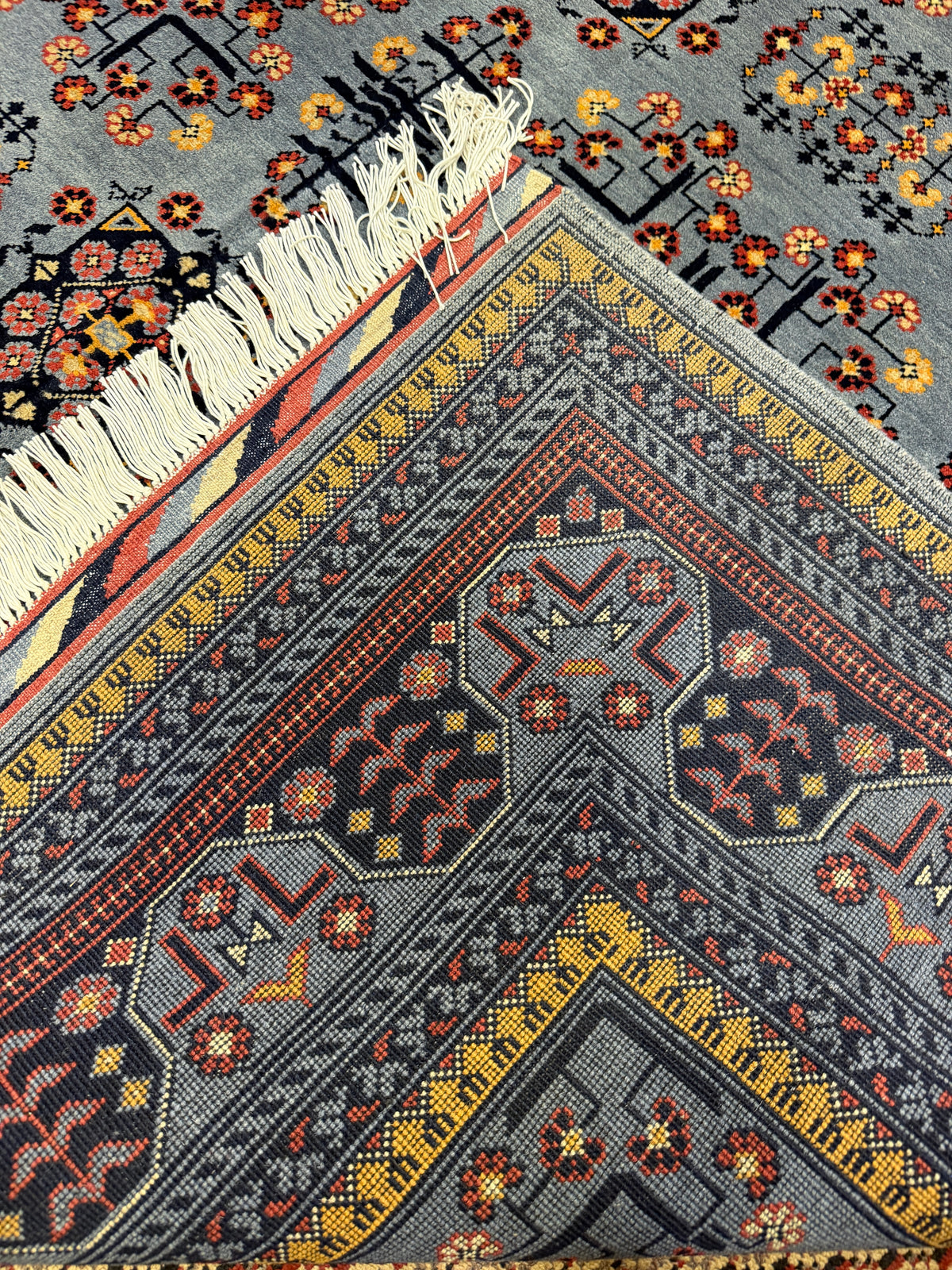 Kazak – Slate Blue & Mauve Medallion Field