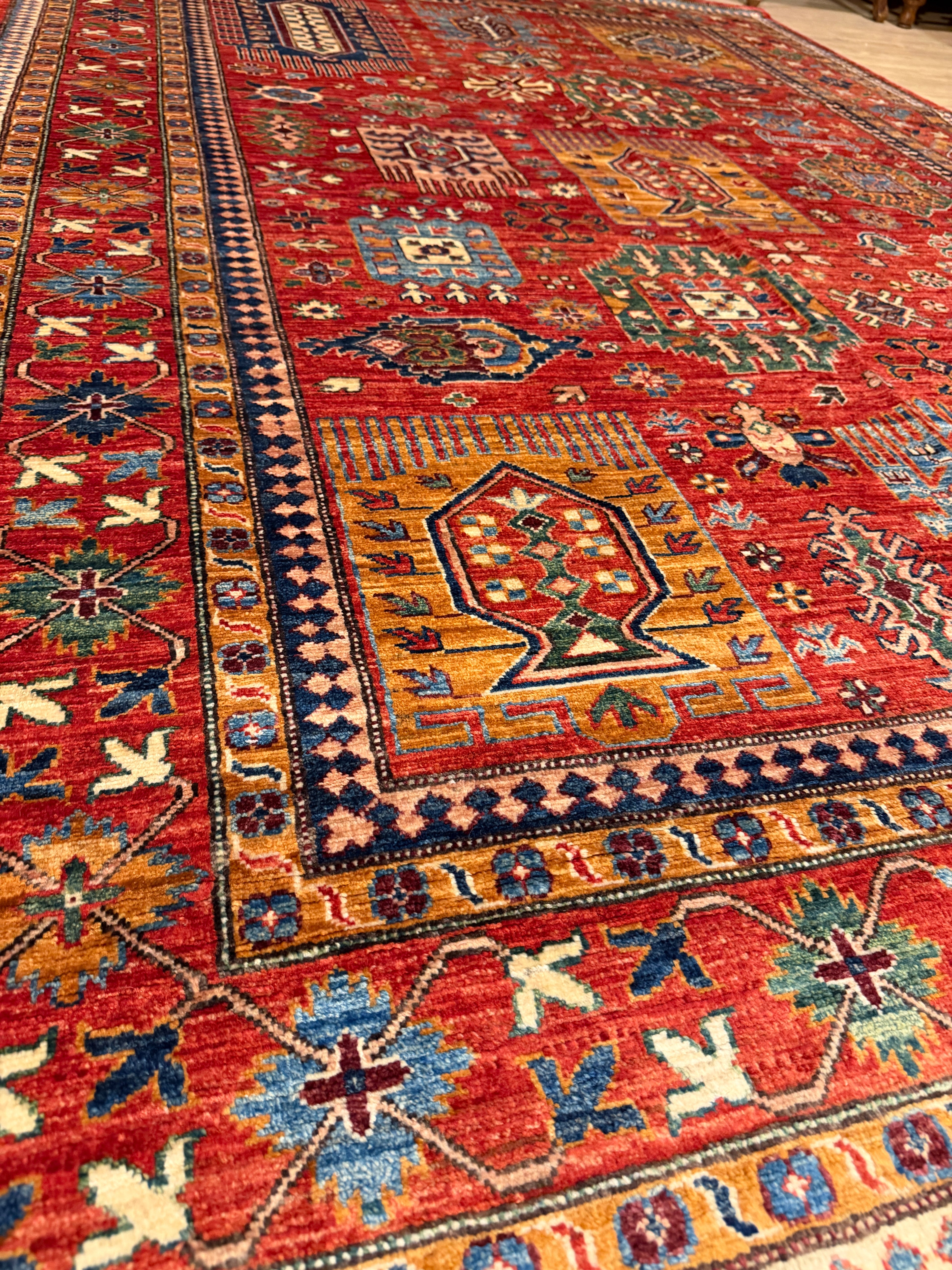 Kazak – Brick Red Scattered Tribal Medallions